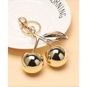 Gold cherry keychain
